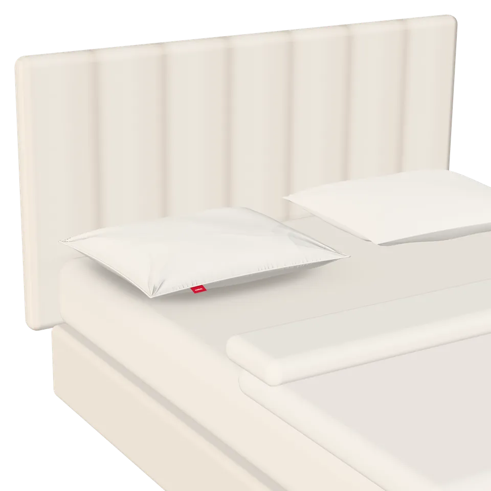 Ein gemachtes Bett mit zwei Kissen auf einem Topper, in 3D gezeichnet
