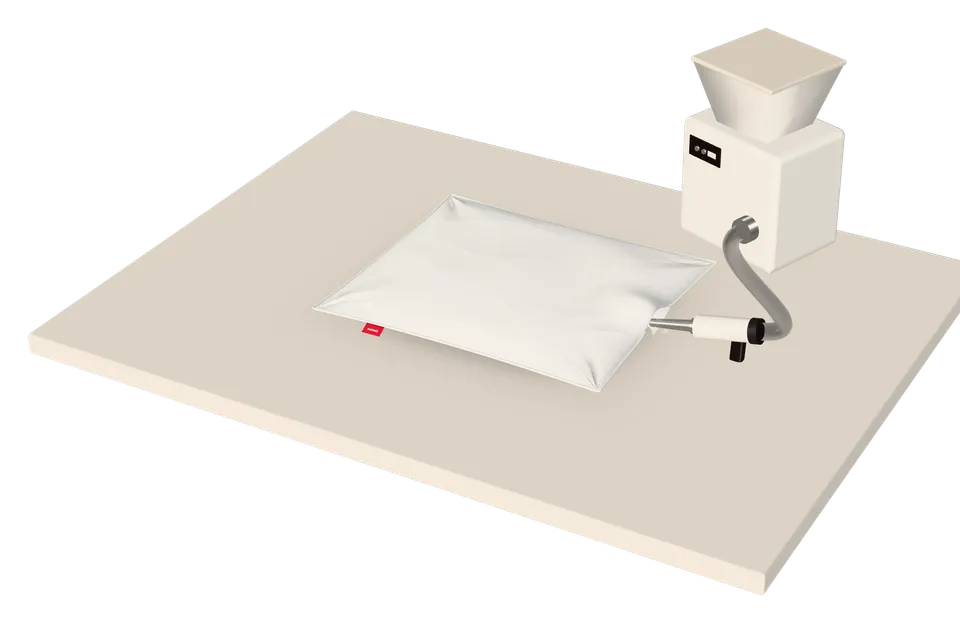 A pillow being filled with blown-in fibre.